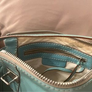Michael Kors used turquoise leather bag